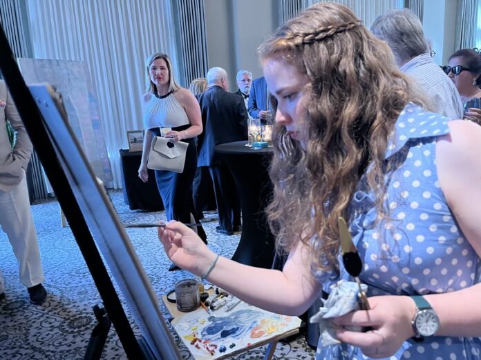Katherine Weaver painting demo at FCCC Gala 2024