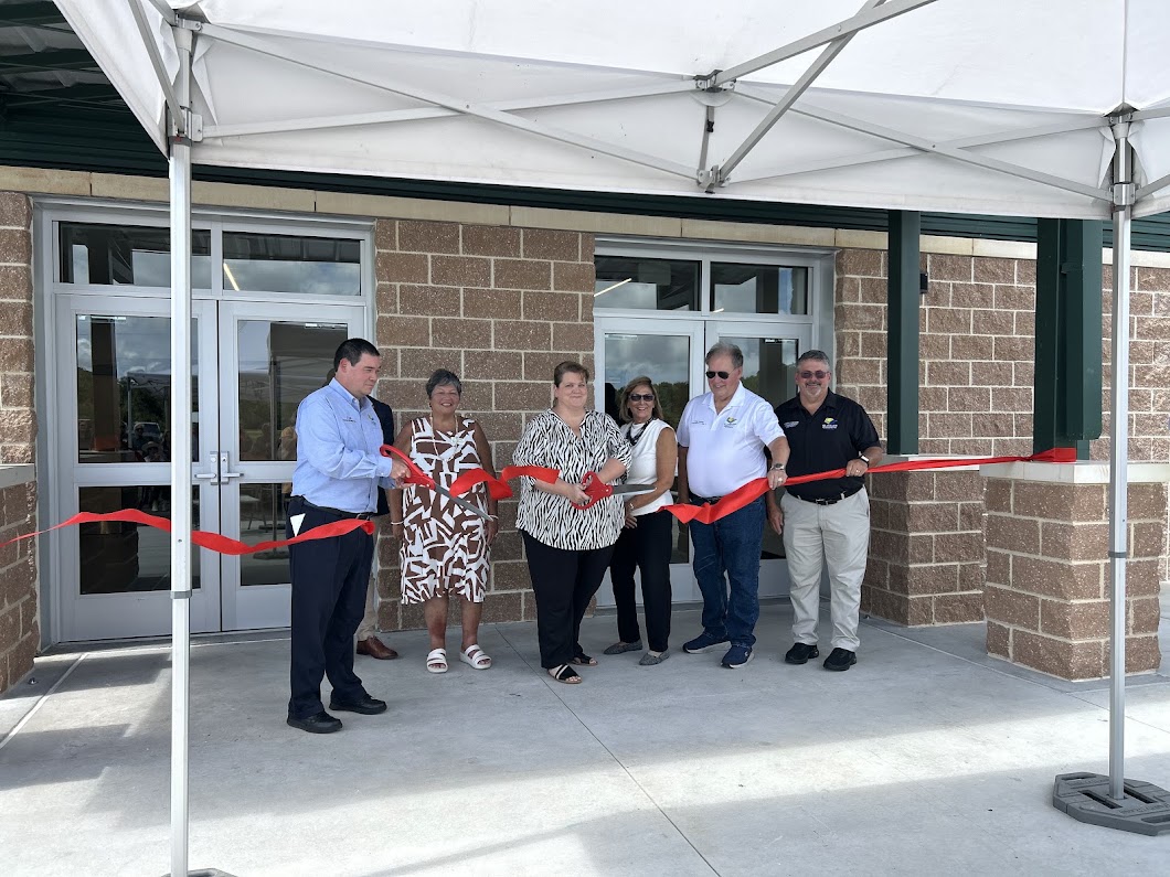 Leann Pennington cuts the ribbon on the Flagler Fairgrounds Expo Hall - 9-23-26 Flagler News Weekly